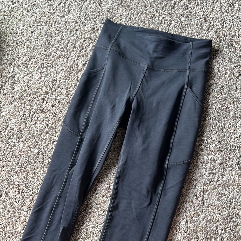 Lululemon dark grey leggings with side pockets, great condition